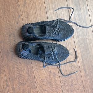 Black adidas boost sneakers